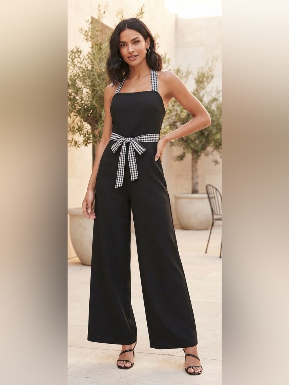 Kittenish Black Jumpsuit with Checkered Straps